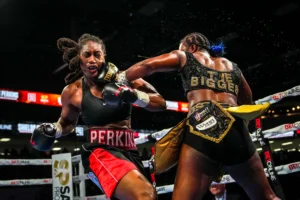 Claressa Shields Becomes First Boxer to Win Undisputed Titles in Three Weight Classes with Dominant Knockout Victory Over Danielle Perkins