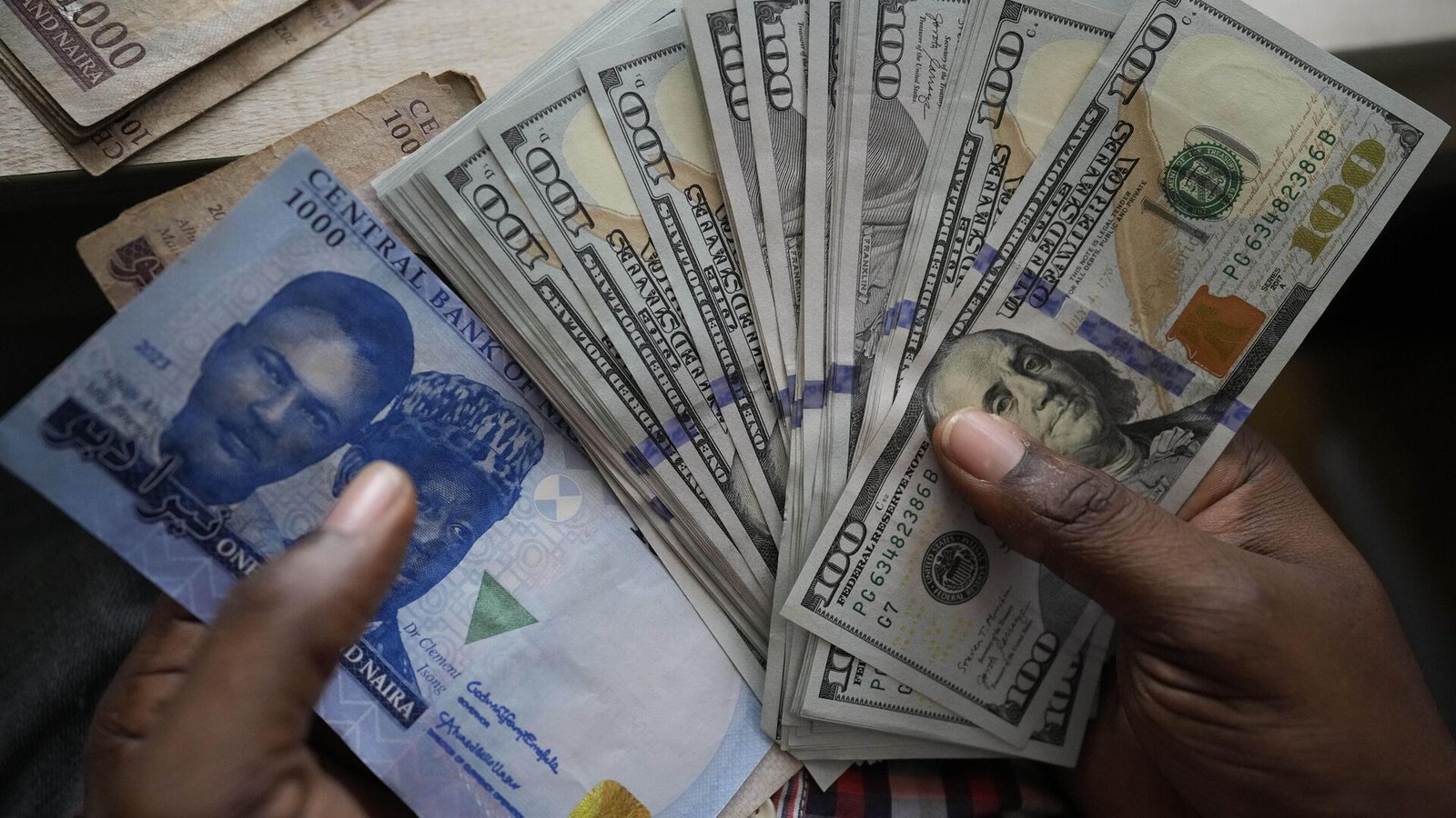 Naira Holds at N1,374 Per Dollar as CBN Reserves Hit $46.7bn But Global Oil Crisis and Hormuz Shutdown Threaten Nigeria's Forex Stability